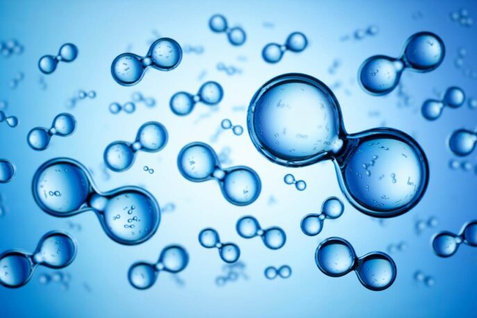 Blue 3D diatomic molecule shapes floating against a blurred light blue background.